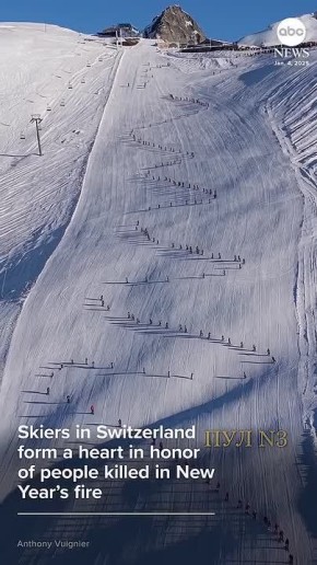 Сердце из лыжников:. В Швейцарии лыжники собрались вместе, чтобы почтить память десятков людей, погибших в результате пожара во время празднования Нового года в баре на швейцарском курорте