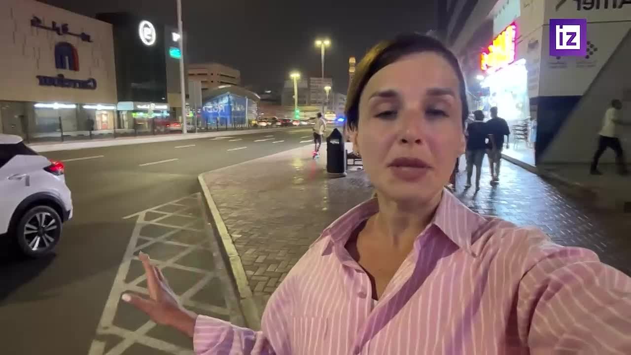 "Дыма и огня уже не видно": обстановку у американского консульства в Дубае, куда ранее прилетел иранский БПЛА, показала "Известиям" ведущая Пятого канала Юлия Вотинцева